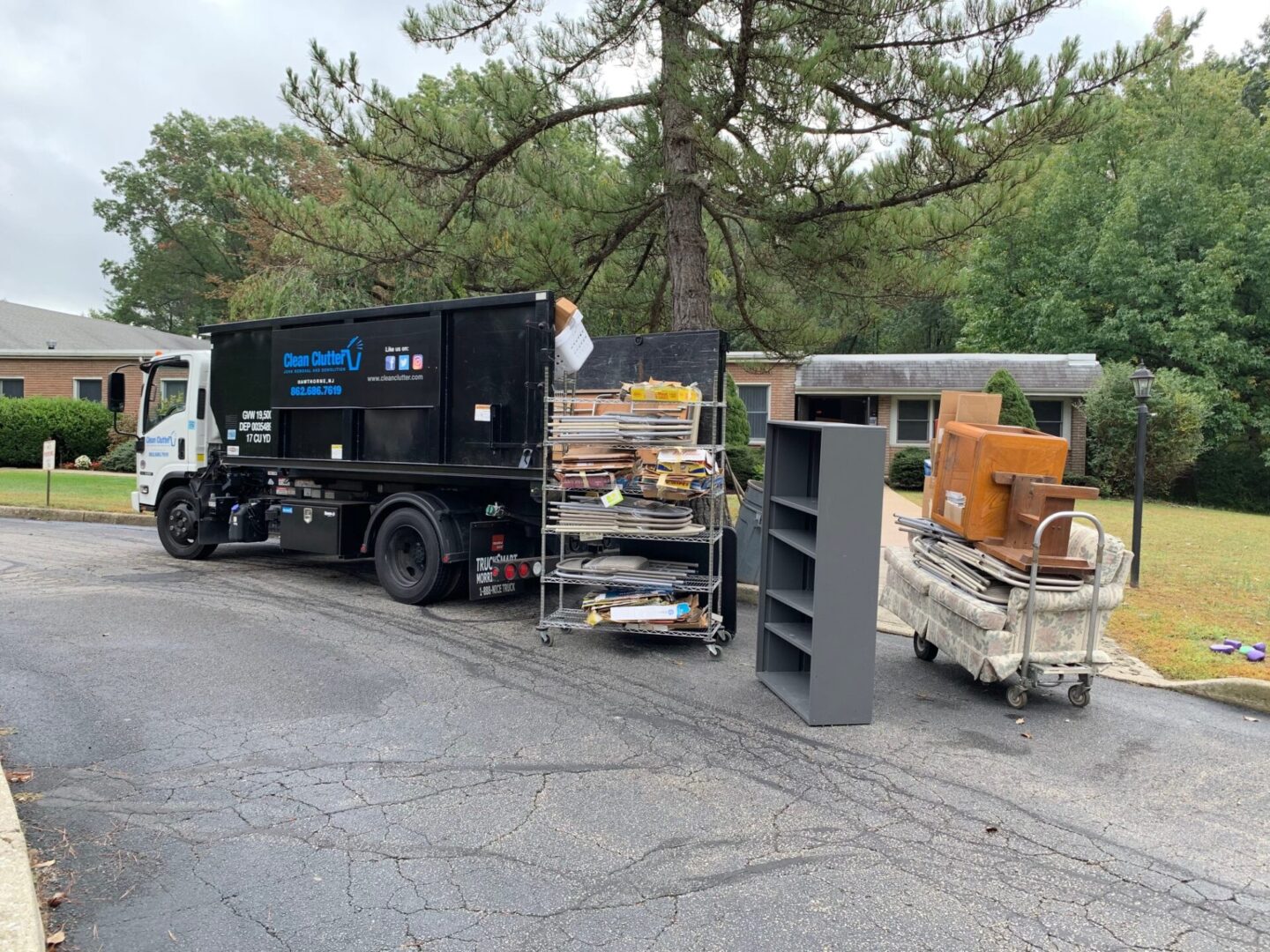 Clean Clutter residential junk removal — furniture staged for pickup